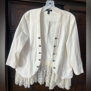Size large-Torrid white twill peplum military jacket with lace hem.